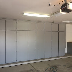 light-colored, floor-to-ceiling storage cabinets